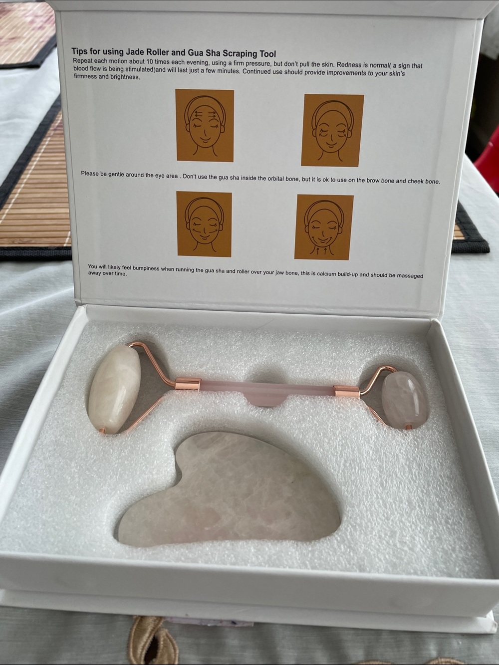 Deciniee  pink jade roller.  Box opened but never used.